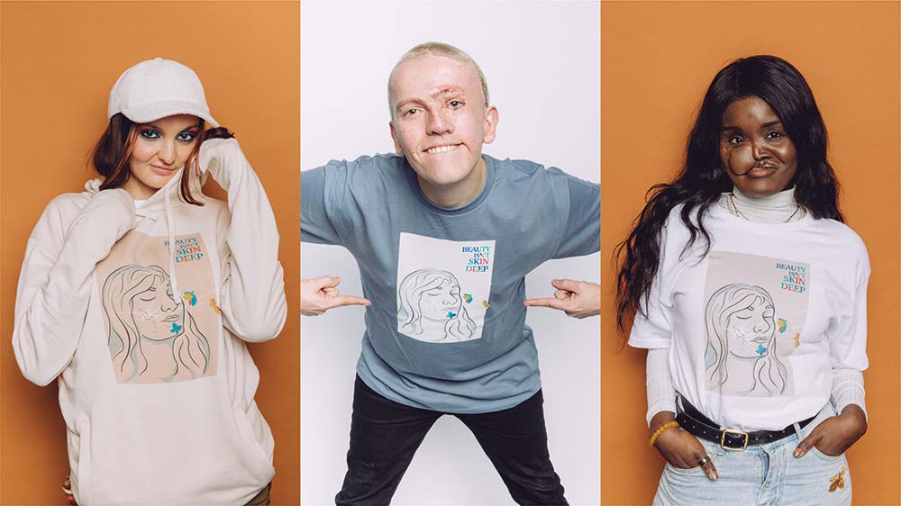 Anthony Lexa, Rob and Crystal wearing the Changing Faces, Anthony Lexa and Teemill clothing collection